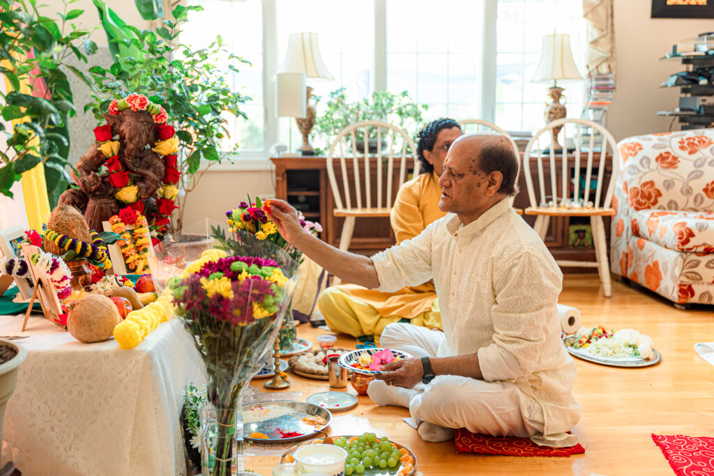 An Indian couple partake in the Haldi before their wedding day.