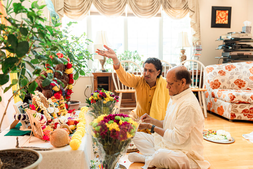 An Indian couple partake in the Haldi before their wedding day.