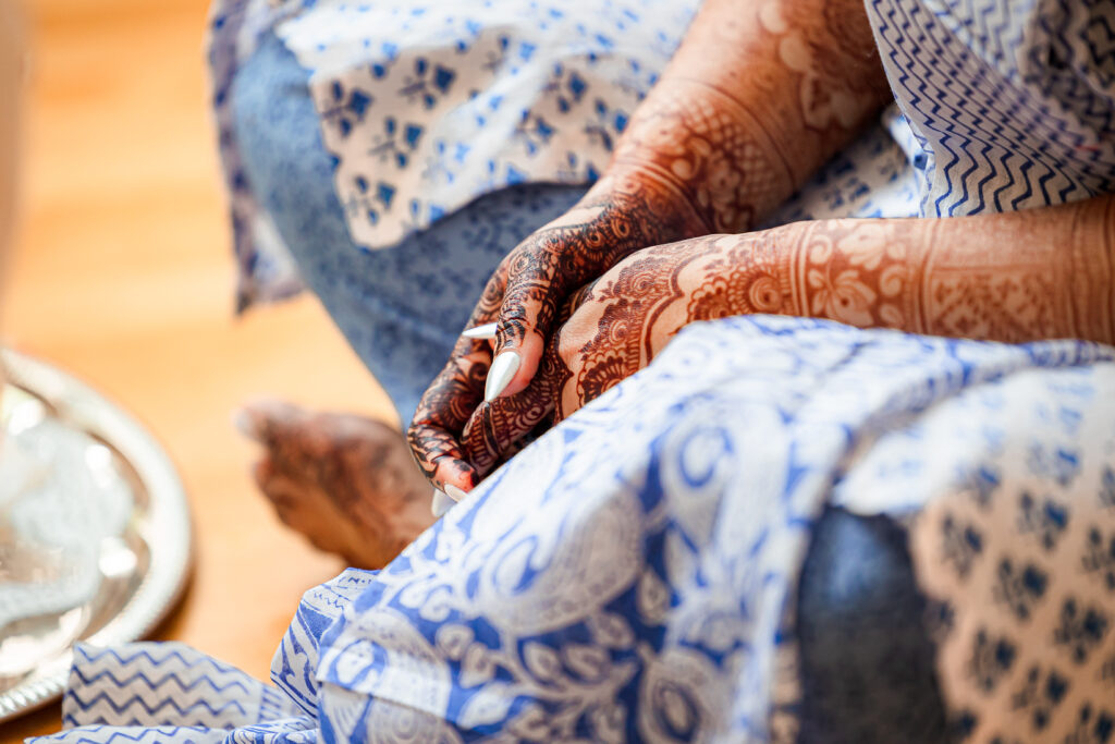An Indian couple partake in the Haldi before their wedding day.