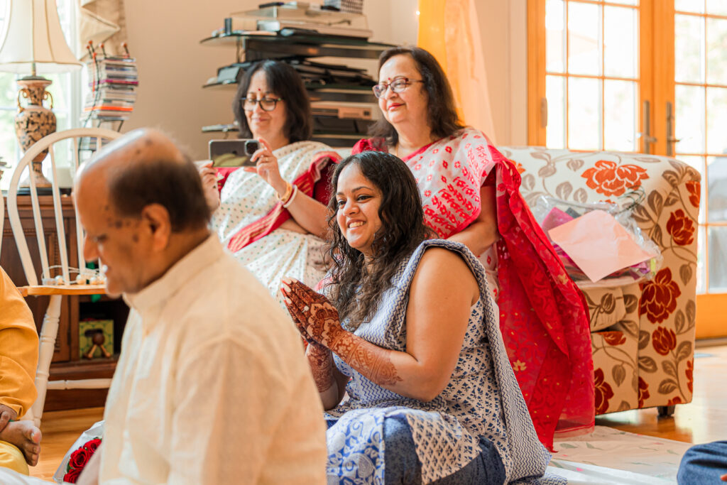 An Indian couple partake in the Haldi before their wedding day.