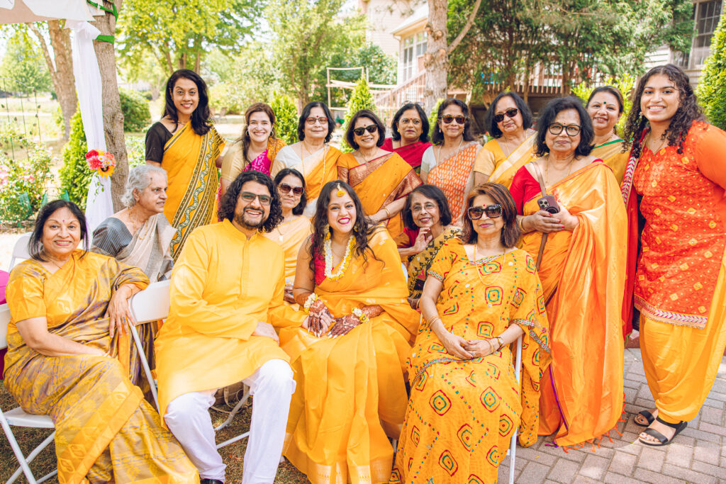 An Indian couple partake in the Haldi before their wedding day.