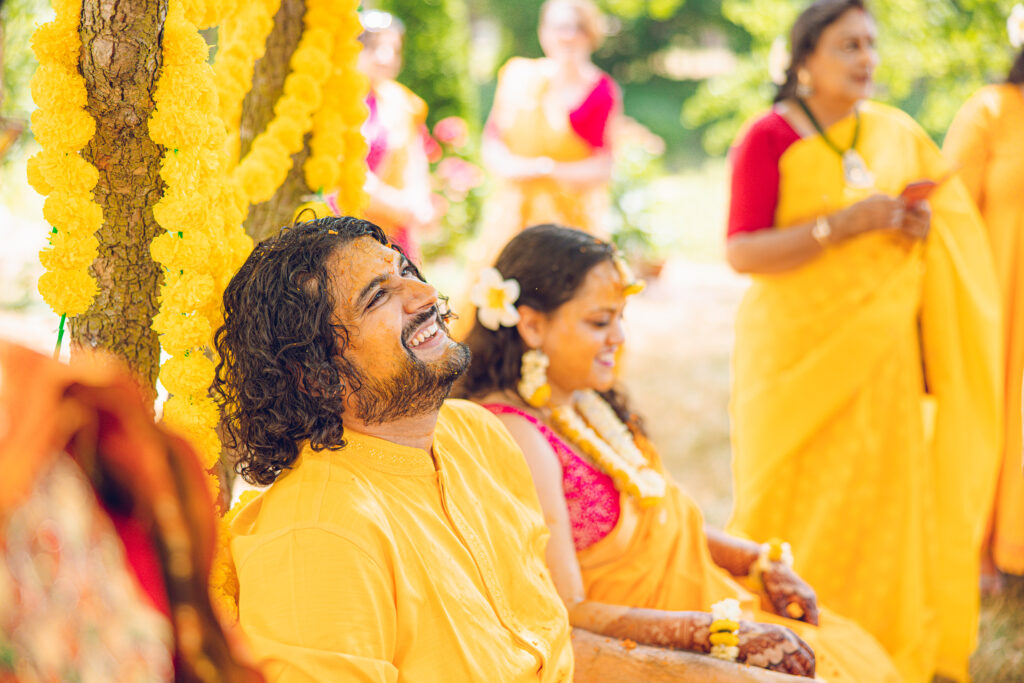 An Indian couple partake in the Haldi before their wedding day.