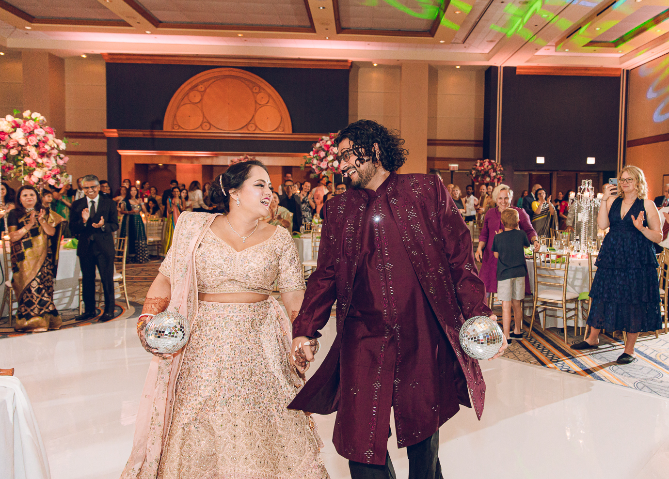 A South Asian couple celebrate their wedding.