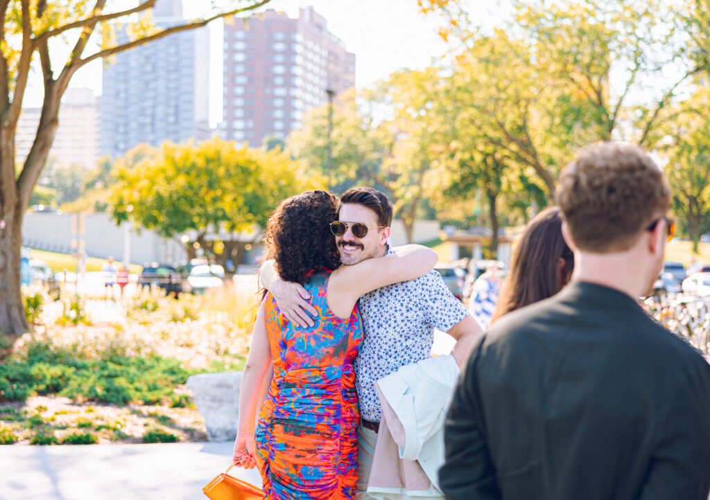 A gay couple exchanges vows at the AIDS Memorial Garden in Chicago.