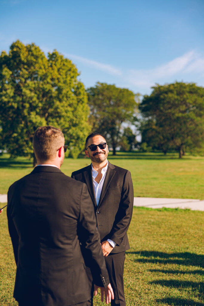 A gay couple exchanges vows at the AIDS Memorial Garden in Chicago.