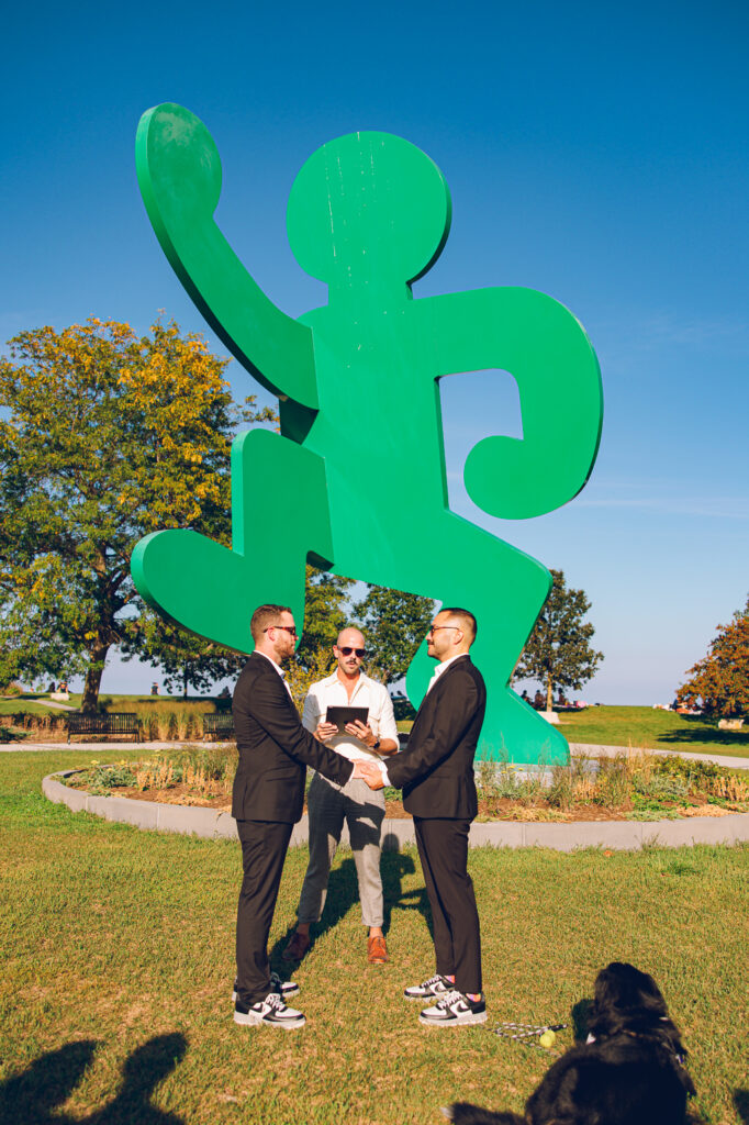 A gay couple exchanges vows at the AIDS Memorial Garden in Chicago.
