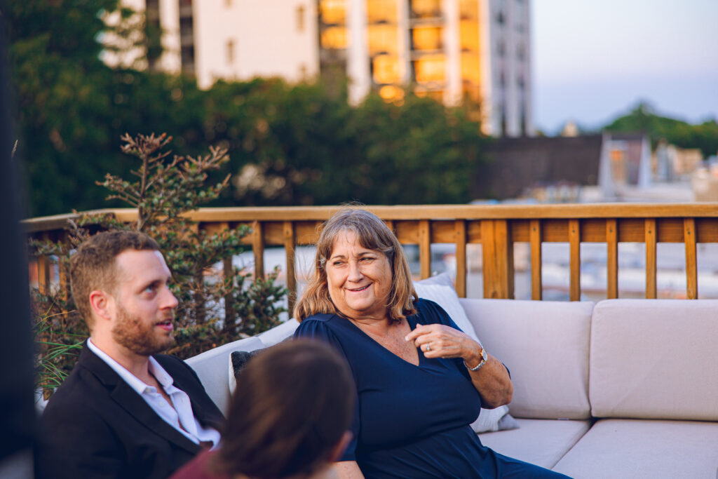 A gay couple celebrates their wedding day at home with a DIY reception on their rooftop in Lakeview, Chicago.
