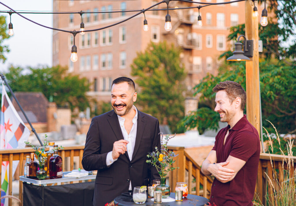 A gay couple celebrates their wedding day at home with a DIY reception on their rooftop in Lakeview, Chicago.