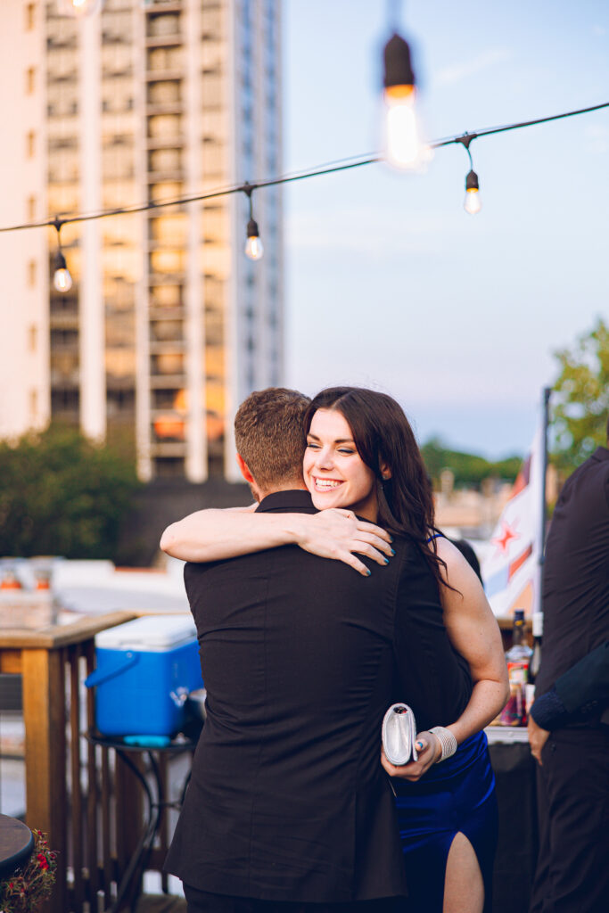 A gay couple celebrates their wedding day at home with a DIY reception on their rooftop in Lakeview, Chicago.