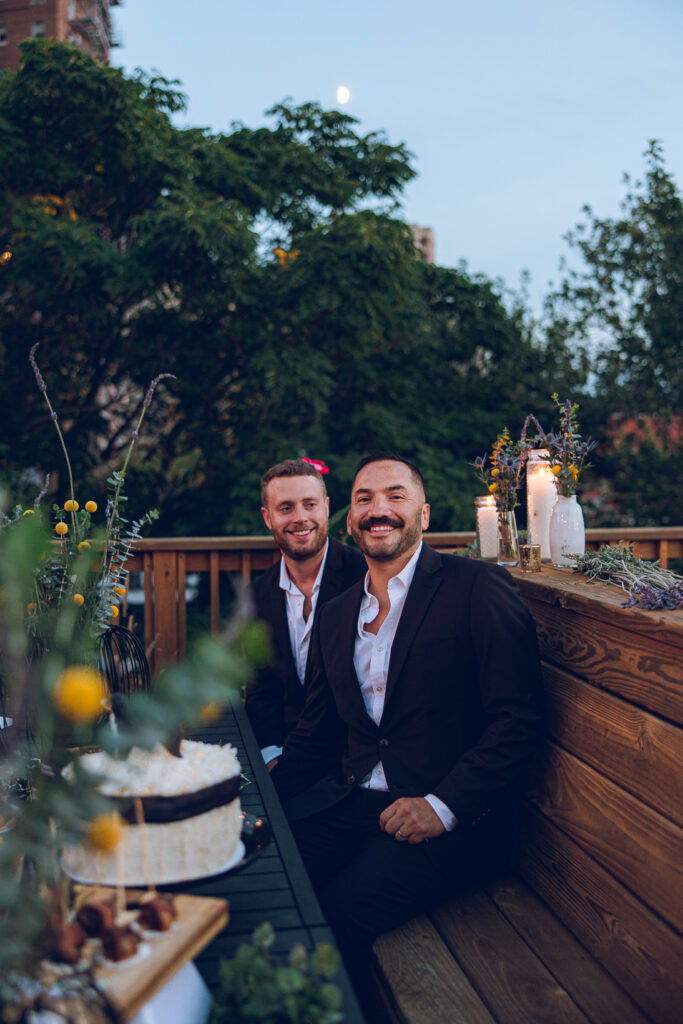 A gay couple celebrates their wedding day at home with a DIY reception on their rooftop in Lakeview, Chicago.