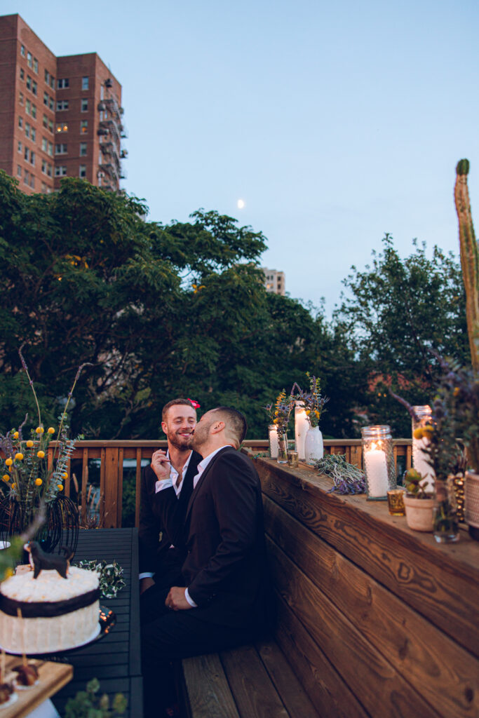 A gay couple celebrates their wedding day at home with a DIY reception on their rooftop in Lakeview, Chicago.
