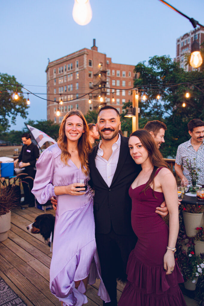 A gay couple celebrates their wedding day at home with a DIY reception on their rooftop in Lakeview, Chicago.