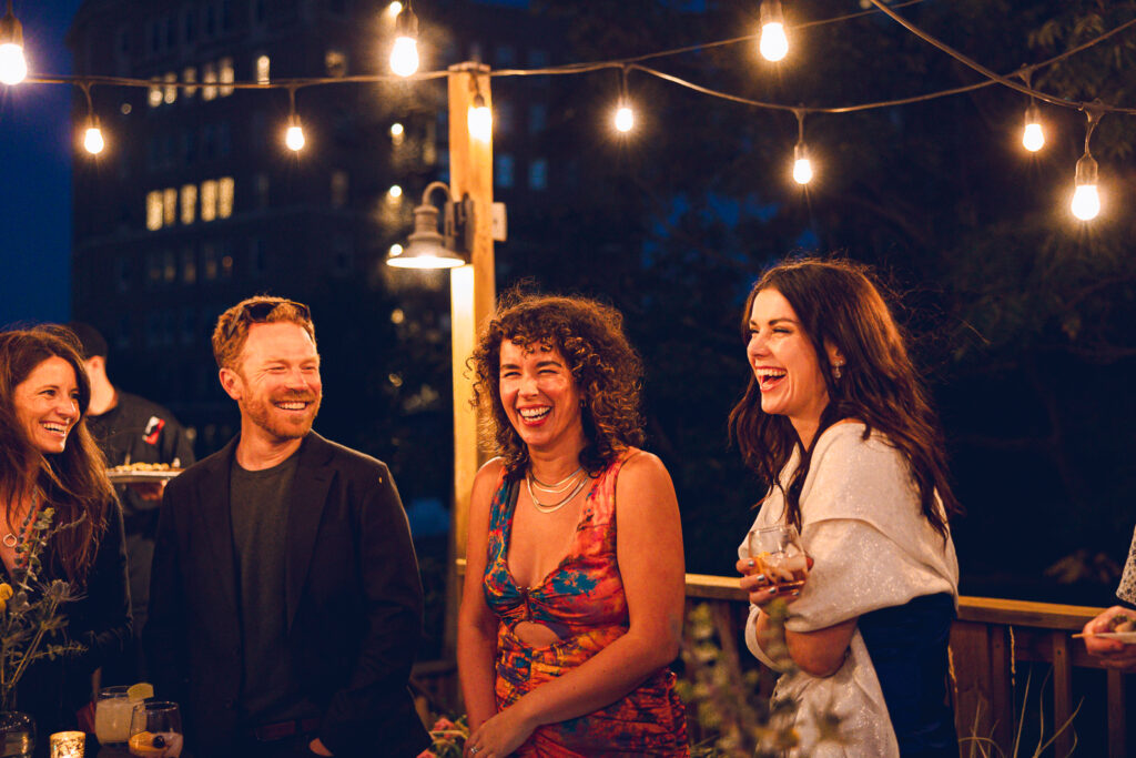A gay couple celebrates their wedding day at home with a DIY reception on their rooftop in Lakeview, Chicago.