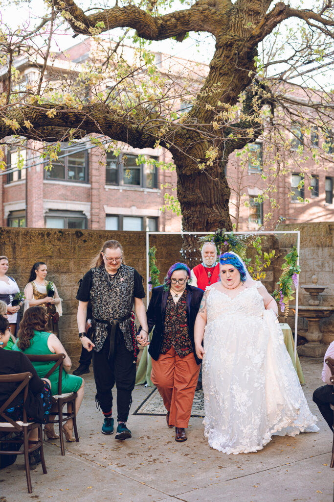 A queer polycule celebrates their wedding day at Colvin House in Chicago.