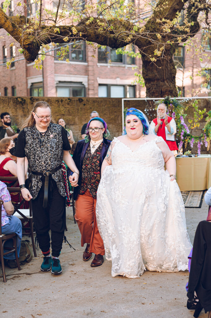 A queer polycule celebrates their wedding day at Colvin House in Chicago.