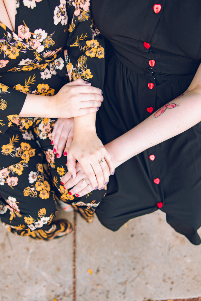 A queer couple poses for their engagement session at the North Pond in Lincoln Park, Chicago.