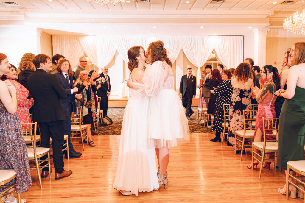A queer couple has their wedding at Abington Distinct Banquets in Glen Ellyn, Illinois.