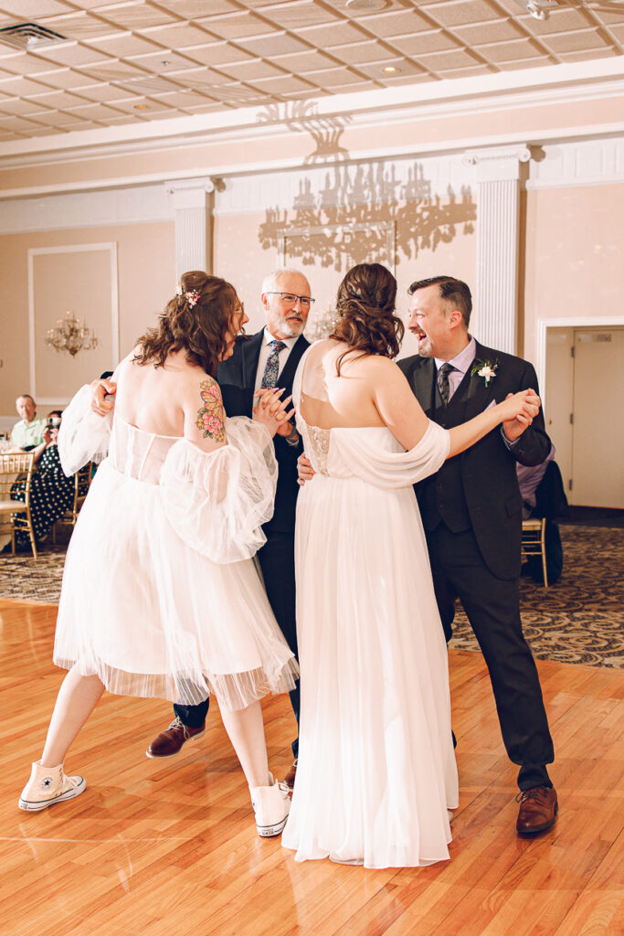 A queer couple has their wedding at Abington Distinct Banquets in Glen Ellyn, Illinois.