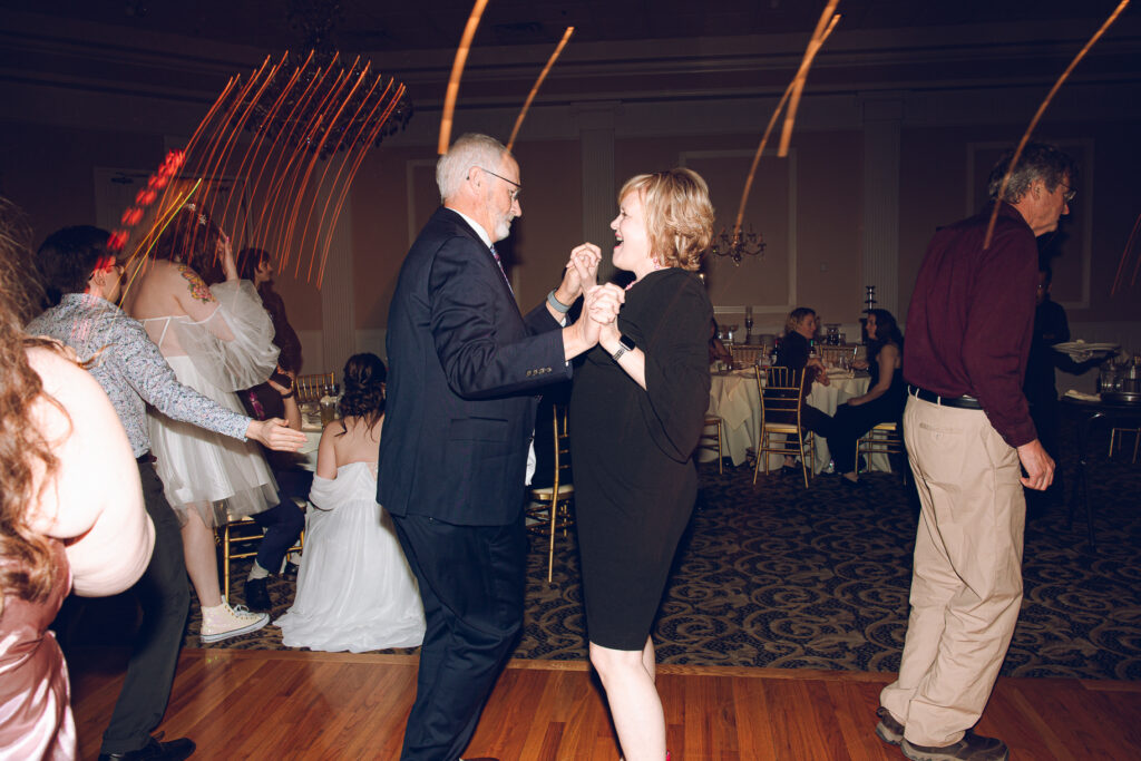 A queer couple has their wedding at Abington Distinct Banquets in Glen Ellyn, Illinois.