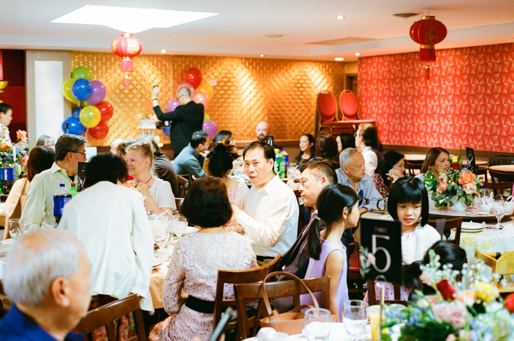 Film photography from a Chinese wedding weekend at The Robey in Wicker Park and Lee Wing Wah in Chinatown, Chicago
