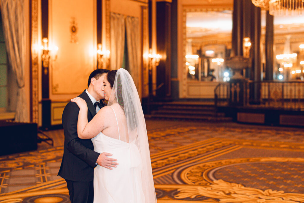 A couple getting ready at the Palmer House Hotel in the Loop in Chicago