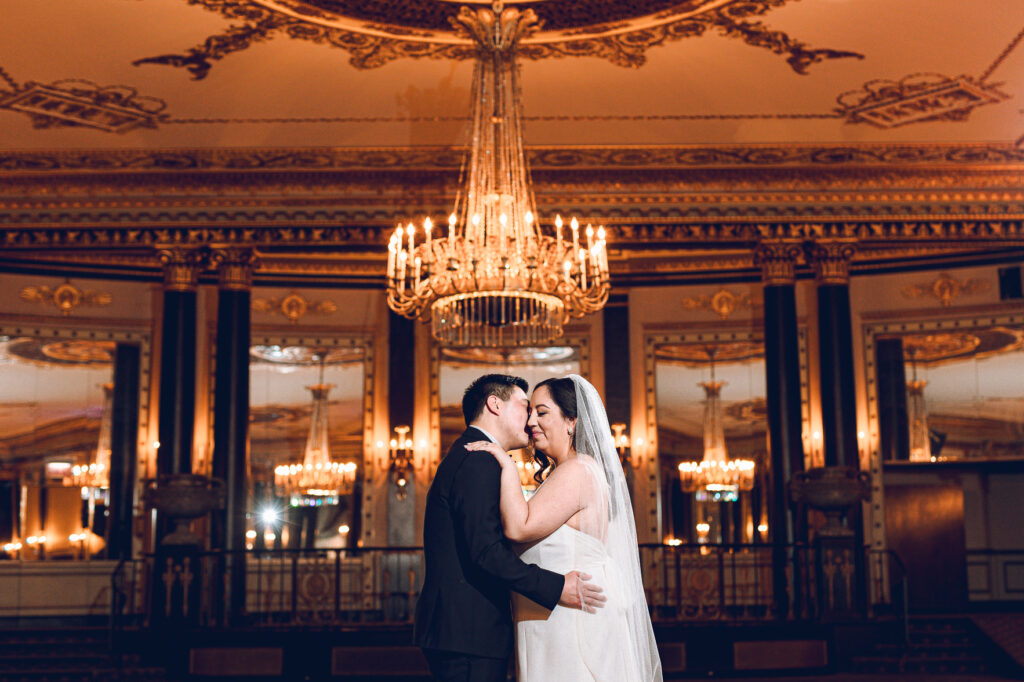 A couple getting ready at the Palmer House Hotel in the Loop in Chicago