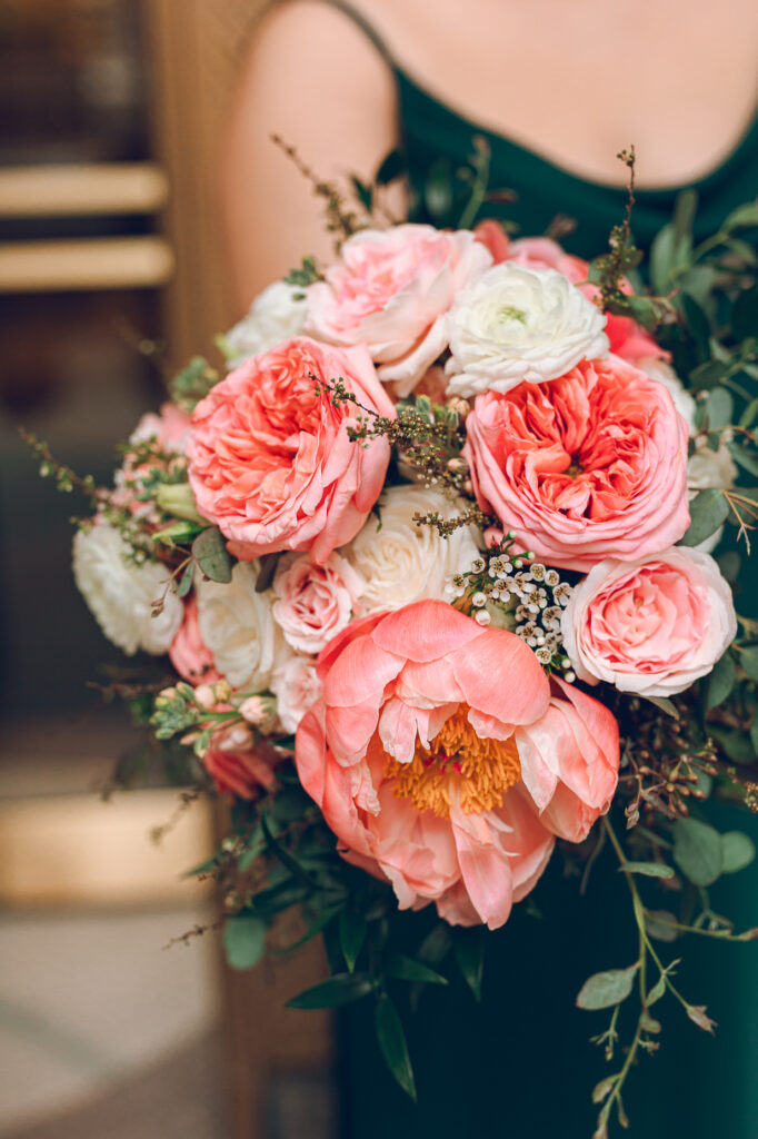 A wedding party under the Civic Opera Building in Chicago