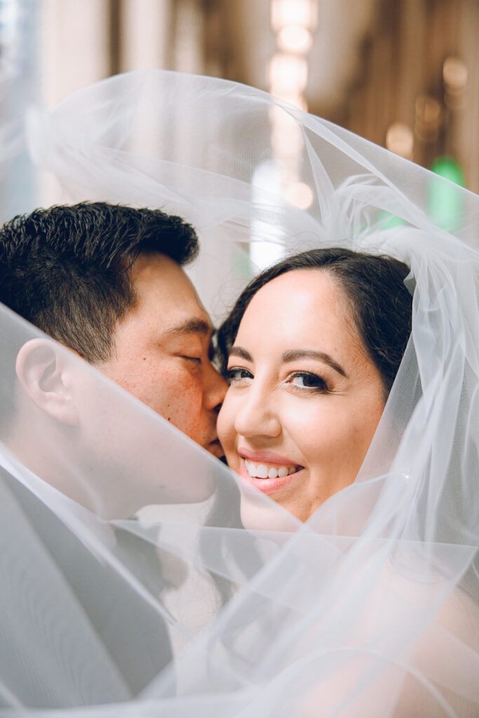 A wedding party under the Civic Opera Building in Chicago
