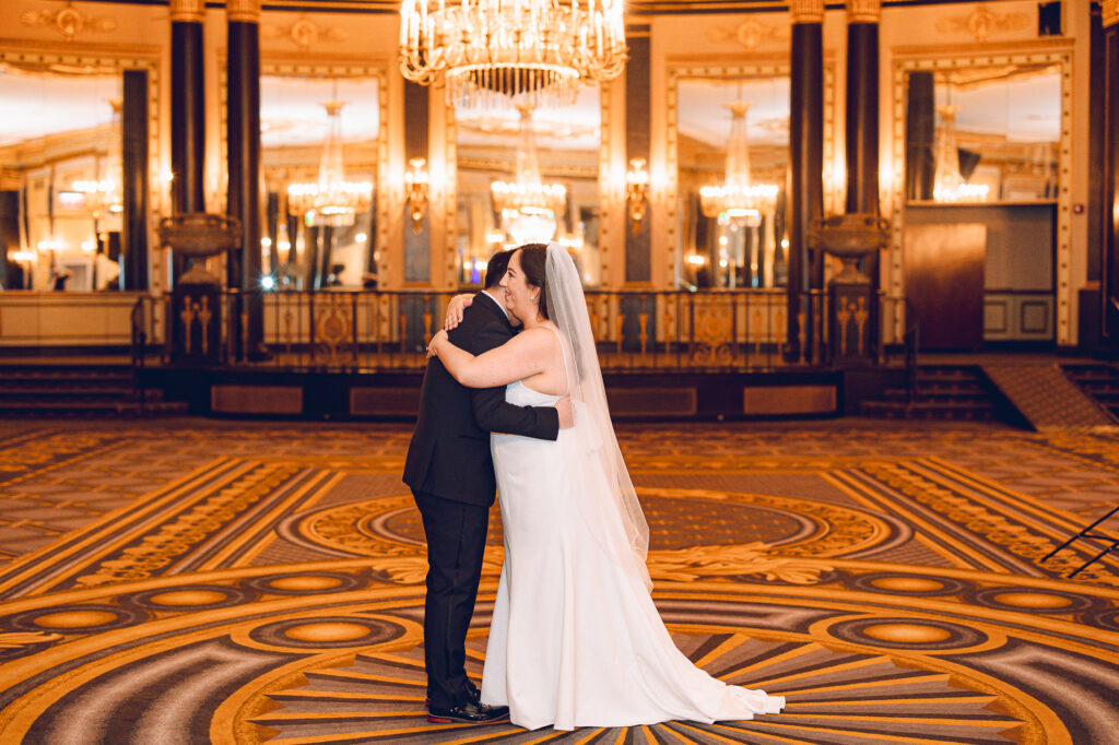 A couple getting ready at the Palmer House Hotel in the Loop in Chicago