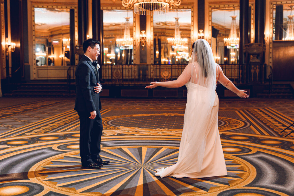 A couple getting ready at the Palmer House Hotel in the Loop in Chicago