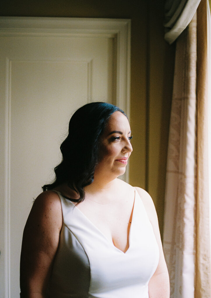 A couple getting ready at the Palmer House Hotel in the Loop in Chicago
