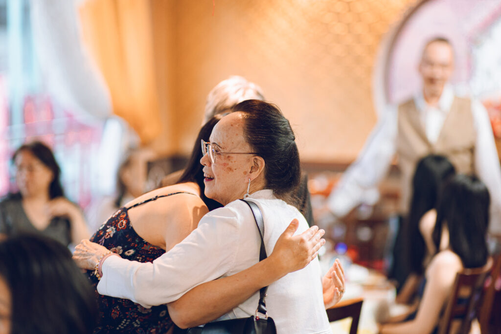 A couple hosts a traditional Chinese wedding reception at Lee Wing Wah in Chinatown, Chicago.