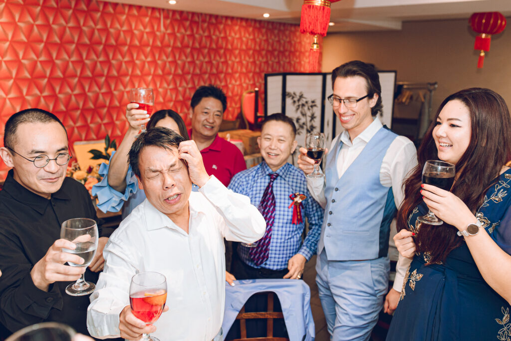 A couple hosts a traditional Chinese wedding reception at Lee Wing Wah in Chinatown, Chicago.