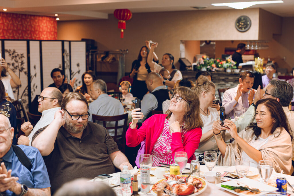 A couple hosts a traditional Chinese wedding reception at Lee Wing Wah in Chinatown, Chicago.