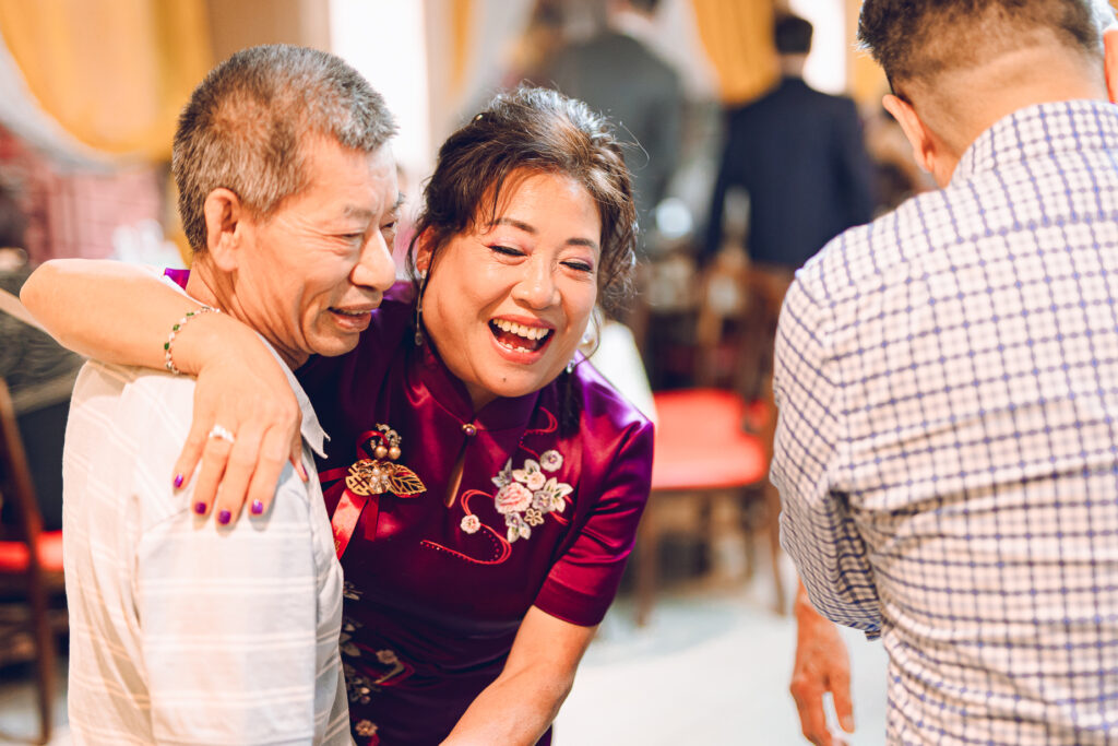 A couple hosts a traditional Chinese wedding reception at Lee Wing Wah in Chinatown, Chicago.