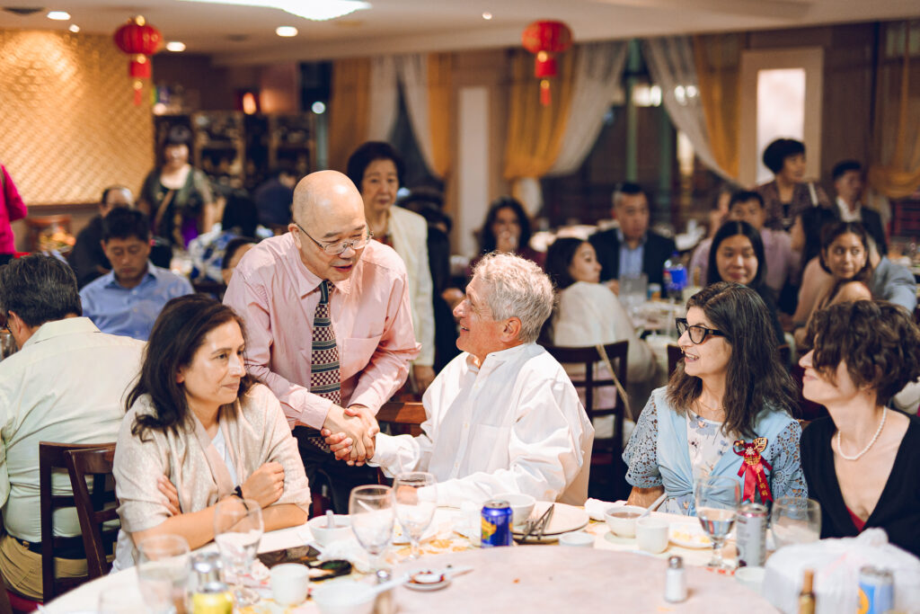 A couple hosts a traditional Chinese wedding reception at Lee Wing Wah in Chinatown, Chicago.