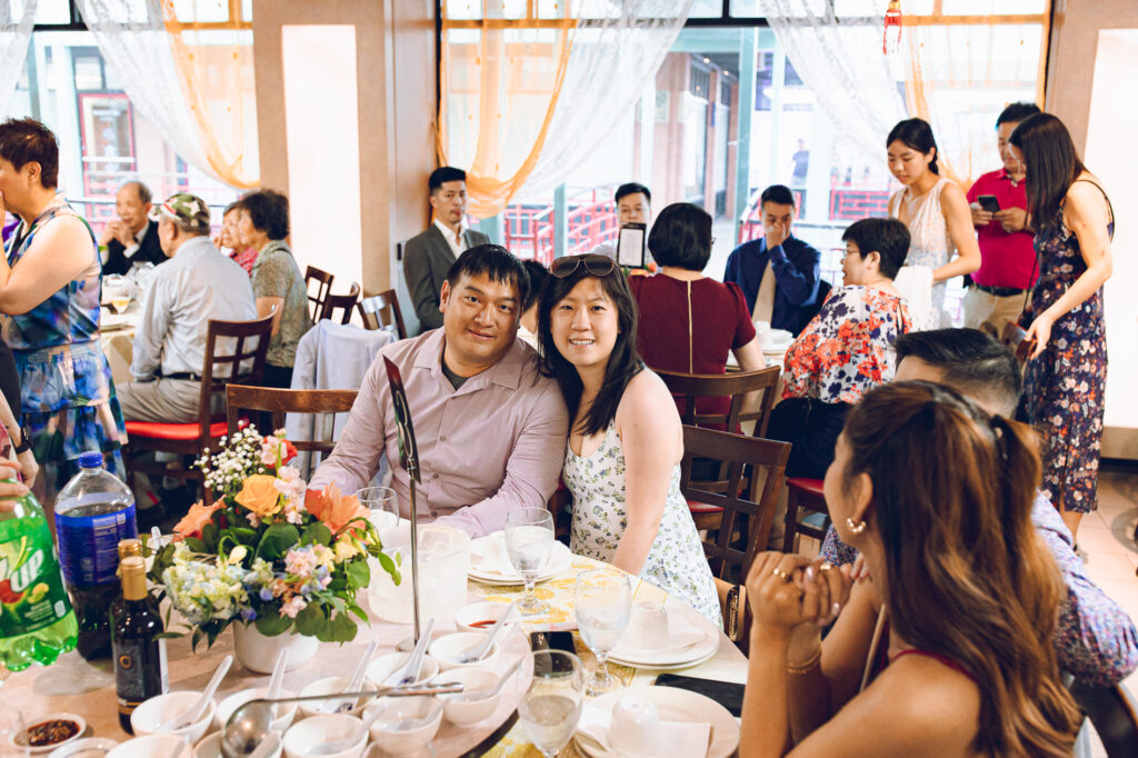 A couple hosts a traditional Chinese wedding reception at Lee Wing Wah in Chinatown, Chicago.