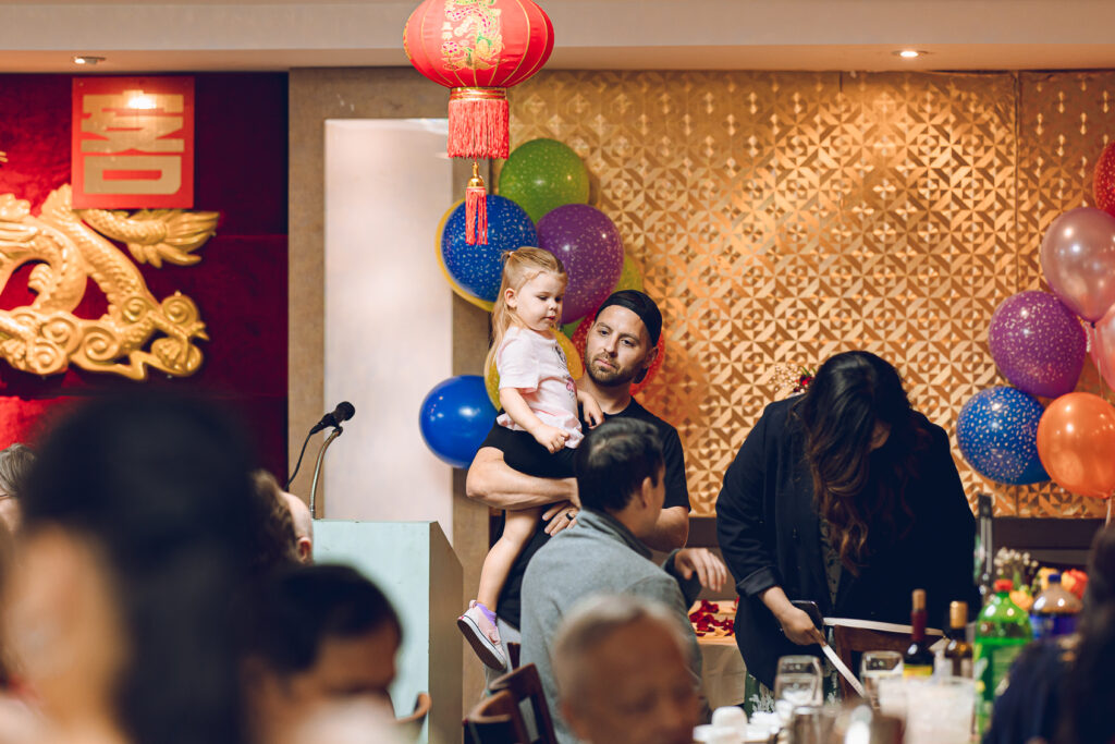 A couple hosts a traditional Chinese wedding reception at Lee Wing Wah in Chinatown, Chicago.
