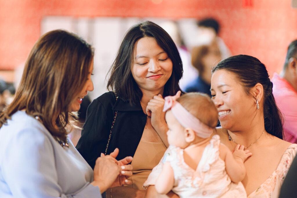 A couple hosts a traditional Chinese wedding reception at Lee Wing Wah in Chinatown, Chicago.