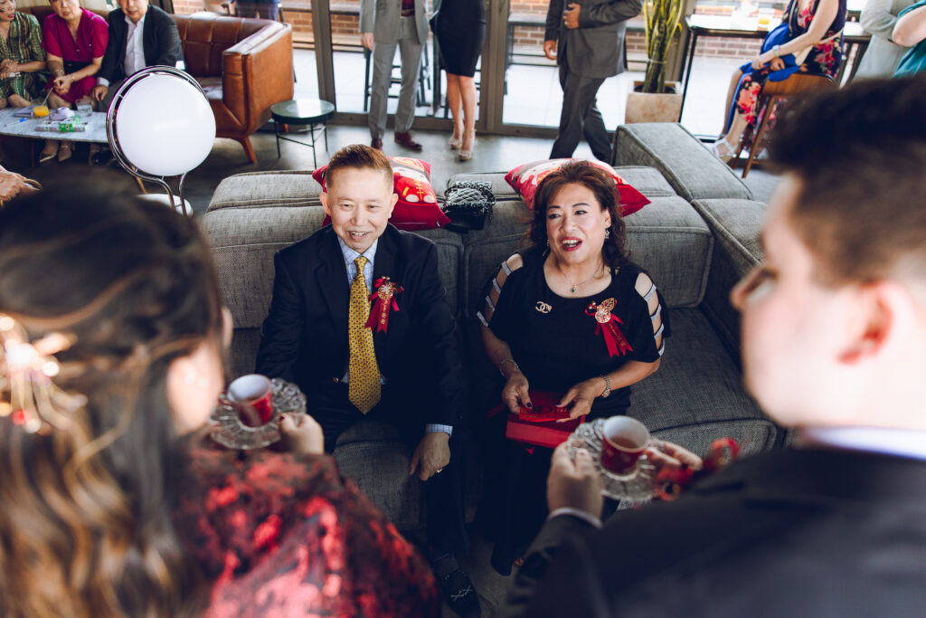 A couple hosts a traditional Chinese tea ceremony as part of their wedding at The Robey in Wicker Park.