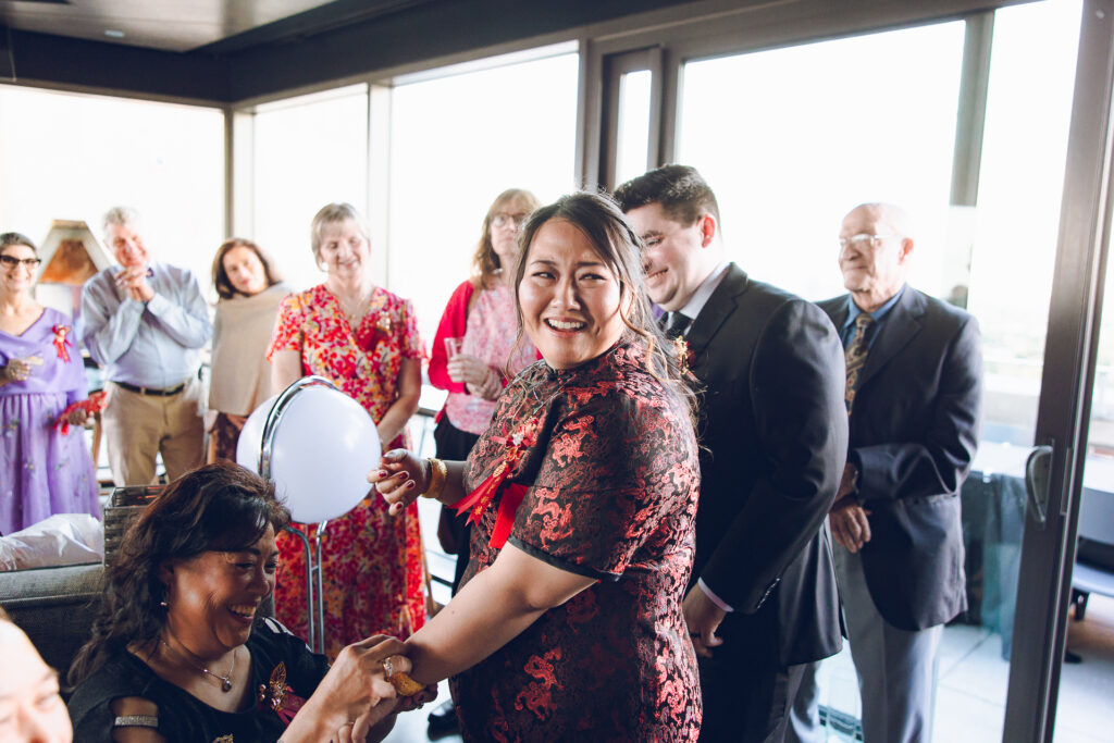 A couple hosts a traditional Chinese tea ceremony as part of their wedding at The Robey in Wicker Park.