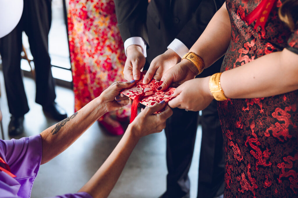 A couple hosts a traditional Chinese tea ceremony as part of their wedding at The Robey in Wicker Park.