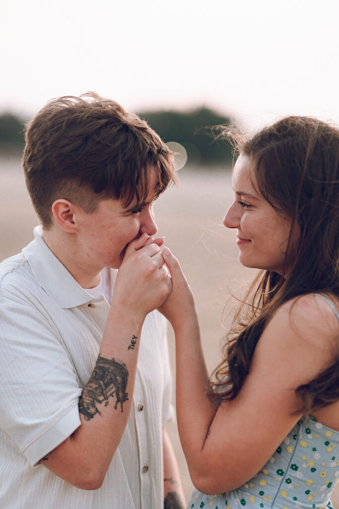 A queer proposal on Montrose Beach at sunset