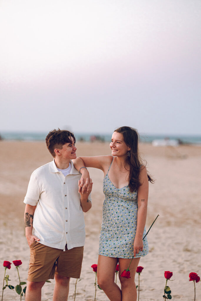 A queer proposal on Montrose Beach at sunset