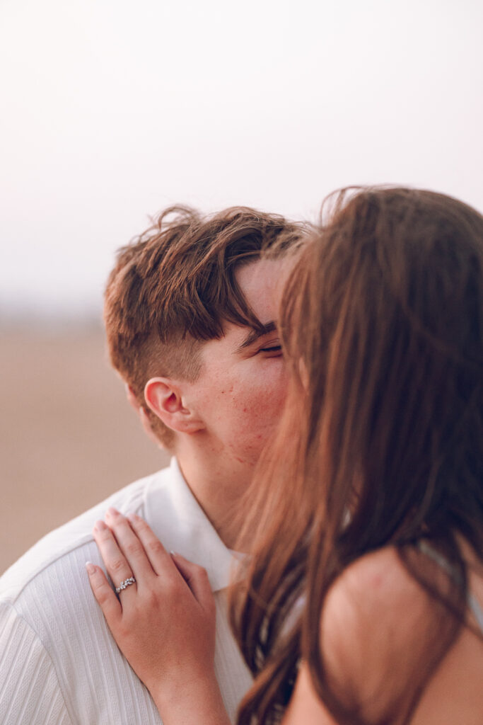 A queer proposal on Montrose Beach at sunset