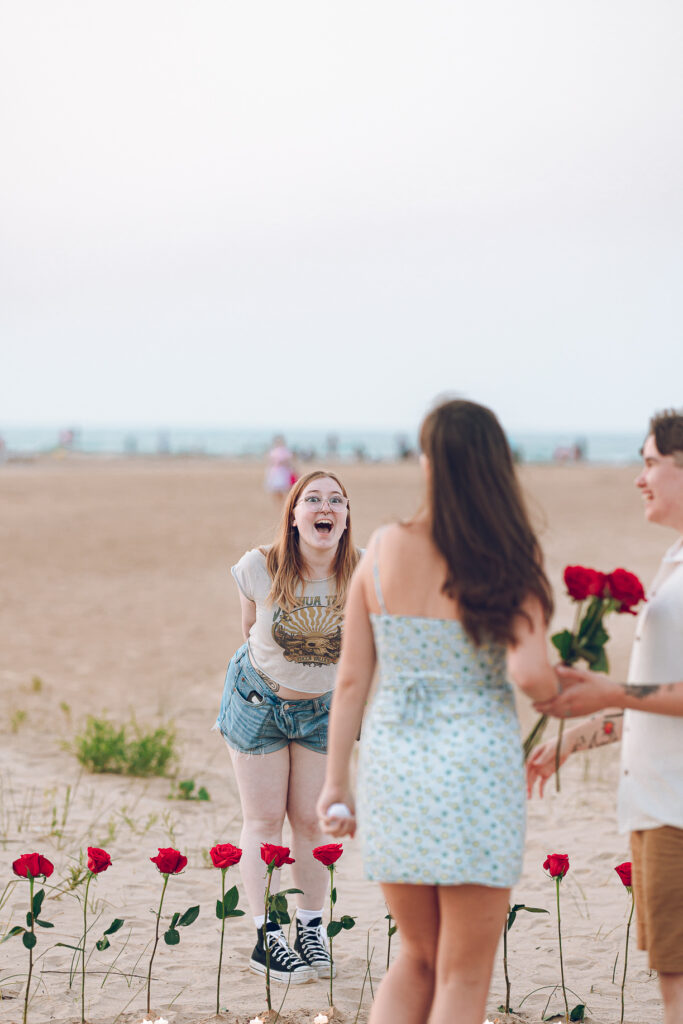 A queer proposal on Montrose Beach at sunset