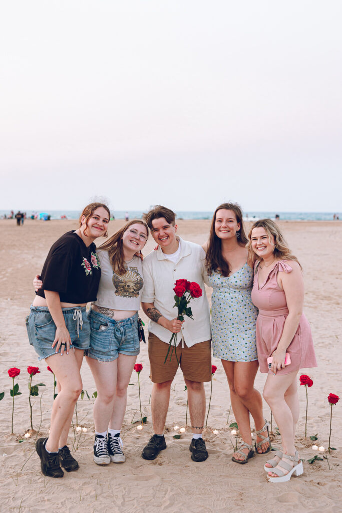 A queer proposal on Montrose Beach at sunset