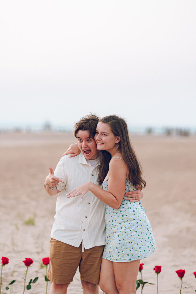 A queer proposal on Montrose Beach at sunset