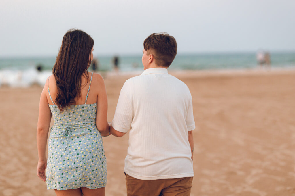 A queer proposal on Montrose Beach at sunset