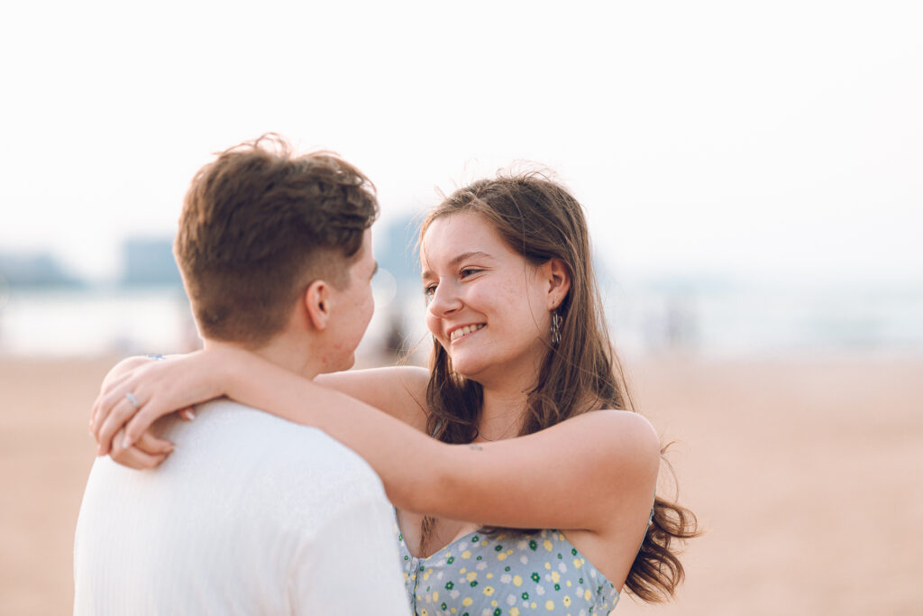 A queer proposal on Montrose Beach at sunset